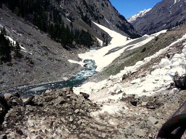 Melting glacier on the way to Kandol Lake, Pakistan; image courtesy of Ameer Boii & Wikimedia Commons