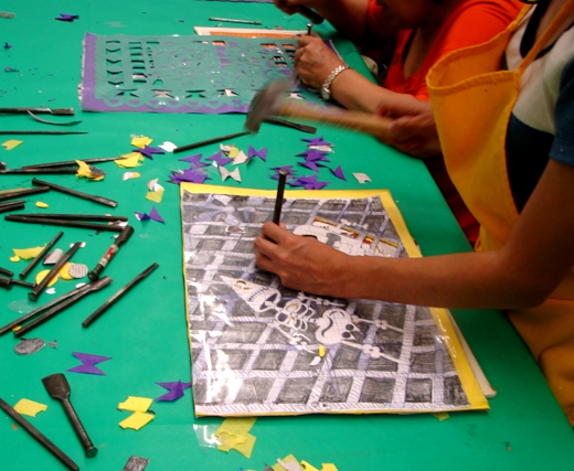 Making papel picado at a workshop at the Museo de Arte Popular; image courtesy of Museum of Popular Art in Mexico City