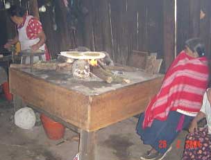 tortillas baking over a traditional fire, image by Cherry Bedenkip of Arizona, USA
