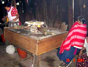 tortillas baking over a traditional fire, image by Cherry Bedenkip of Arizona, USA