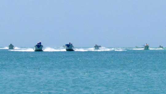 boats returning from gathering sea cucumbers at Río Lagartos